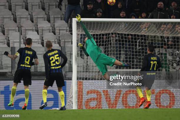 Inter goalkeeper Samir Handanovic dives for the ball during the Serie A football match n.23 JUVENTUS - INTER on at the Juventus Stadium in Turin,...