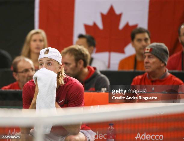 Denis Shapovalov of Canada reacts to hitting chair umpire Arnaud Gabas in the eye with a ball and forfeiting the the singles match against Kyle...