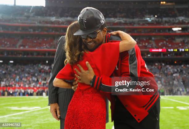 Angela Macuga, Atlanta Falcons owner Arthur Blank and Usher speak prior to Super Bowl 51 against the New England Patriots at NRG Stadium on February...