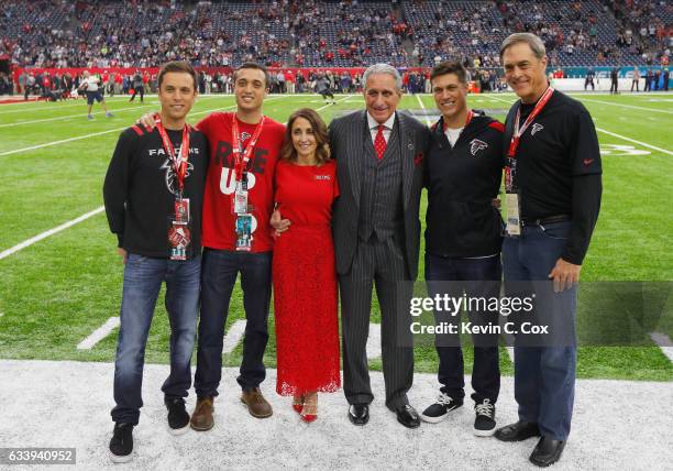 Angela Macuga and Atlanta Falcons owner Arthur Blank pose with family prior to Super Bowl 51 against the New England Patriots at NRG Stadium on...