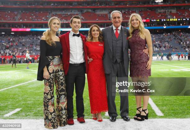 Angela Macuga and Atlanta Falcons owner Arthur Blank pose with family prior to Super Bowl 51 against the New England Patriots at NRG Stadium on...