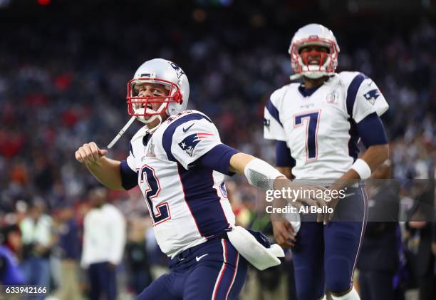 Tom Brady and Jacoby Brissett of the New England Patriots take the field prior to Super Bowl 51 against the Atlanta Falcons at NRG Stadium on...