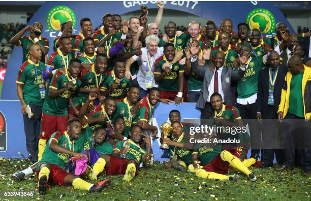 Players of Cameroon celebrate during the awards ceremony after winning the final match in 2017 Africa Cup of Nations at the d'Angondje Stadium in...