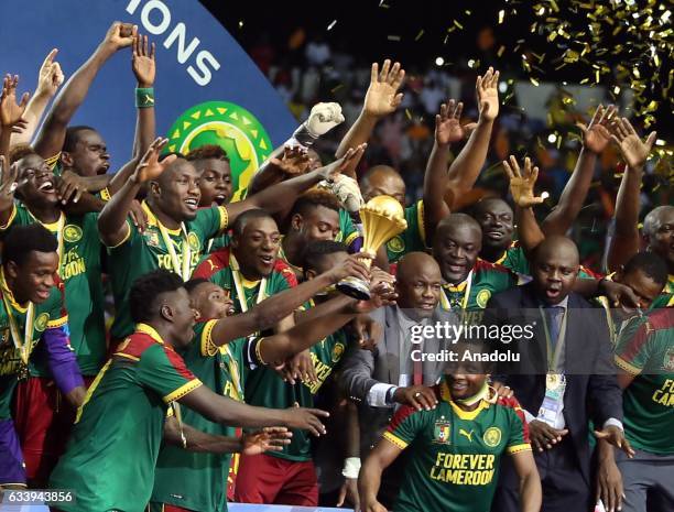 Players of Cameroon celebrate during the awards ceremony after winning the final match in 2017 Africa Cup of Nations at the d'Angondje Stadium in...