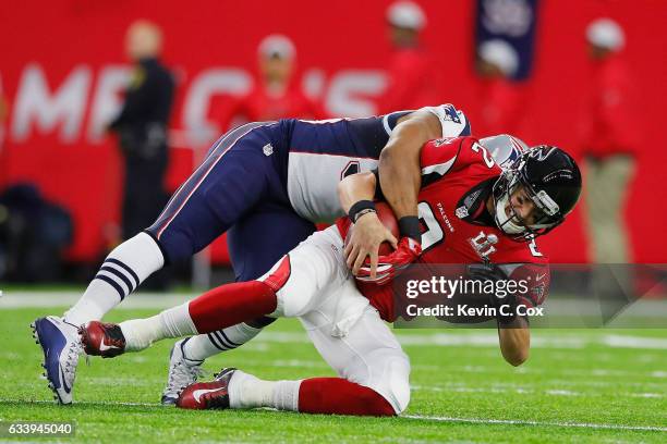 Matt Ryan of the Atlanta Falcons is sacked by Trey Flowers of the New England Patriots in the first quarter during Super Bowl 51 at NRG Stadium on...