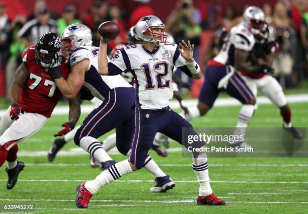 Tom Brady of the New England Patriots looks to pass in the first quarter against the Atlanta Falcons during Super Bowl 51 at NRG Stadium on February...