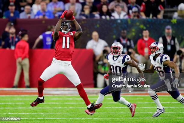 Julio Jones of the Atlanta Falcons makes a catch over Danny Amendola of the New England Patriots in the second quarter during Super Bowl 51 at NRG...