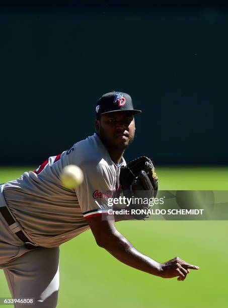 Pitcher Ariel Pena of Tigres del Licey from Dominican Republic throws against Aguilas del Zulia of Venezuela during the Caribbean Baseball Series at...