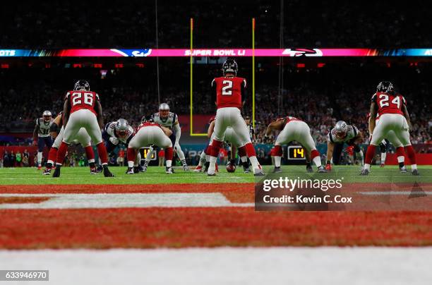 Matt Ryan of the Atlanta Falcons prepares for a snap in the first quarter against the New England Patriots during Super Bowl 51 at NRG Stadium on...