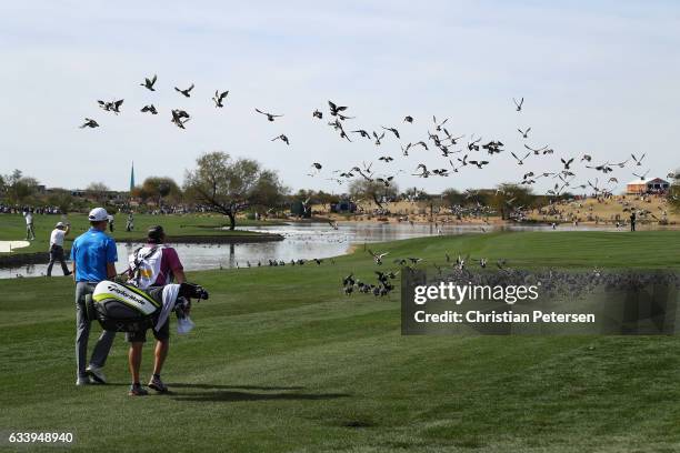 Martin Laird of Scotland walks down the 11th hole during the final round of the Waste Management Phoenix Open at TPC Scottsdale on February 5, 2017...