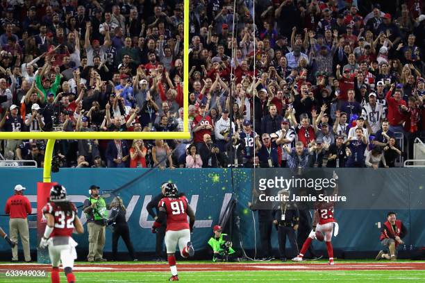 Robert Alford of the Atlanta Falcons reacts after scoring a touchdown on a 82 yard interception against the New England Patriots in the second...