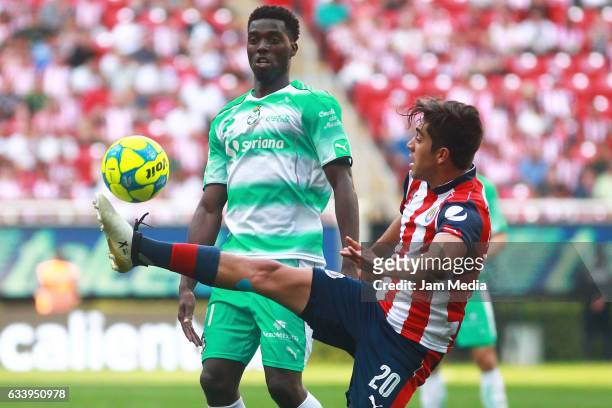 Jorge Djaniny Tavares of Santos and Rodolfo Pizarro of Chivas fight for the ball during the 5th round match between Chivas and Santos as part of the...