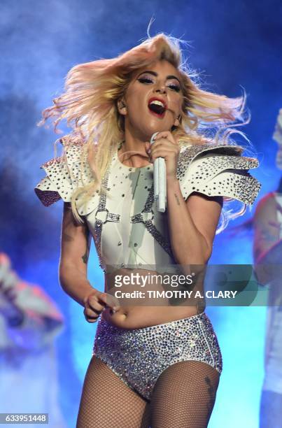 Singer Lady Gaga performs during the halftime show of Super Bowl LI at NGR Stadium in Houston, Texas, on February 5, 2017. / AFP PHOTO / Timothy A....