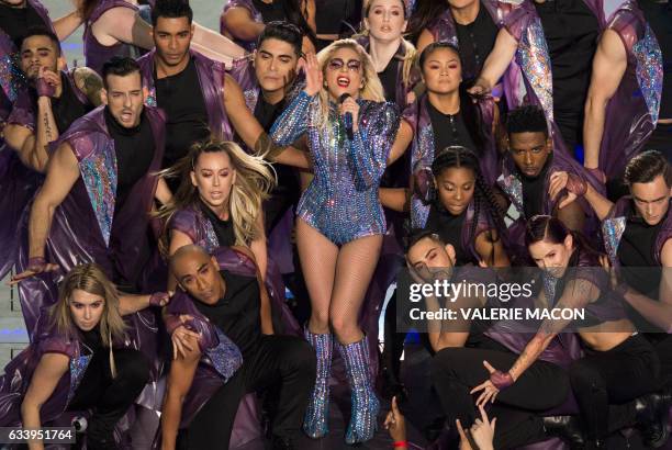 Singer Lady Gaga performs during the Pepsi Super Bowl LI Halftime Show at Houston NRG Stadium in Houston, Texas, February 5, 2017. / AFP PHOTO /...