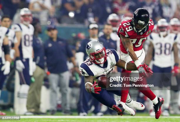 Goodwin of the Atlanta Falcons breaks up a pass intended for Dion Lewis of the New England Patriots in the third quarter during Super Bowl 51 at NRG...