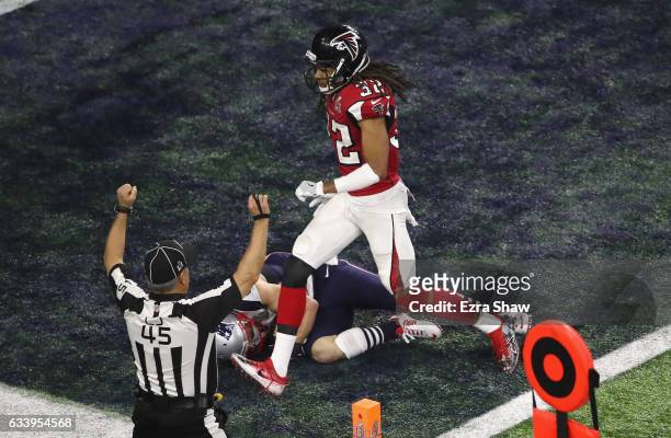 Danny Amendola of the New England Patriots catches a six yard touchdown in the fourth quarter against Jalen Collins of the Atlanta Falcons in the...