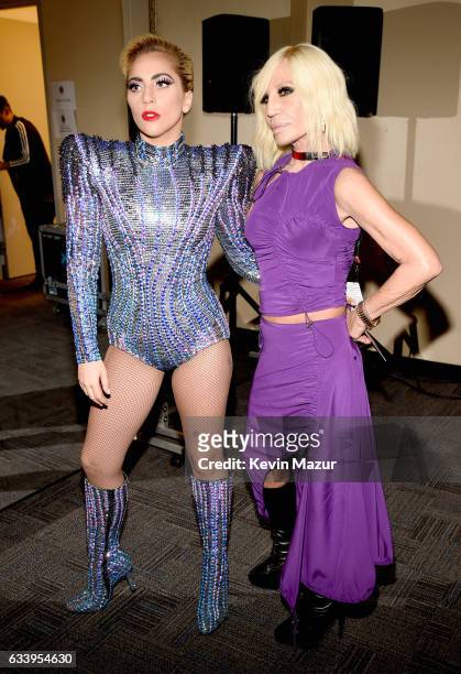 Musician Lady Gaga and fashion designer Donatella Versace pose backstage before the Pepsi Zero Sugar Super Bowl LI Halftime Show at NRG Stadium on...