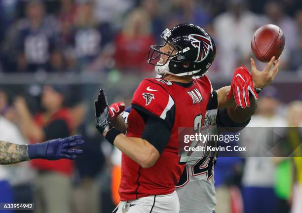 Dont'a Hightower of the New England Patriots forces a fumble from Matt Ryan of the Atlanta Falcons during the fourth quarter during Super Bowl 51 at...