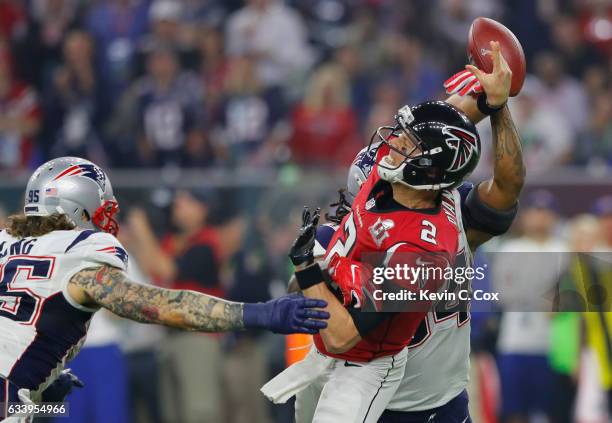 Dont'a Hightower of the New England Patriots forces a fumble from Matt Ryan of the Atlanta Falcons during the fourth quarter during Super Bowl 51 at...