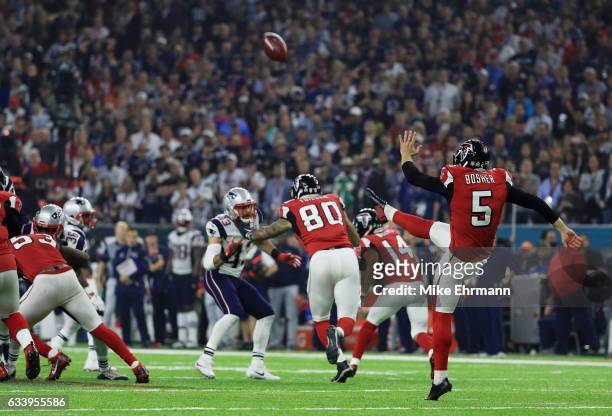 Matt Bosher of the Atlanta Falcons punts the ball against the New England Patriots in the fourth quarter during Super Bowl 51 at NRG Stadium on...