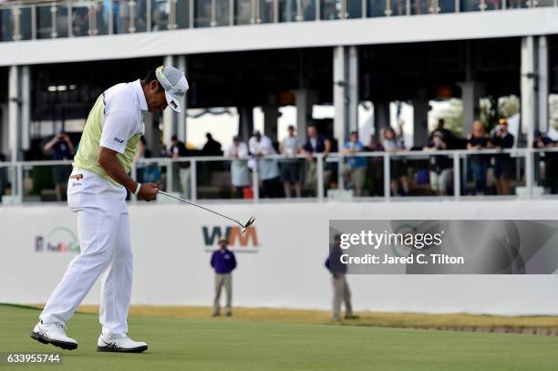 Hideki Matsuyama of Japan reacts after making his birdie putt on the fourth playoff hole on the 17th green during the final round of the Waste...