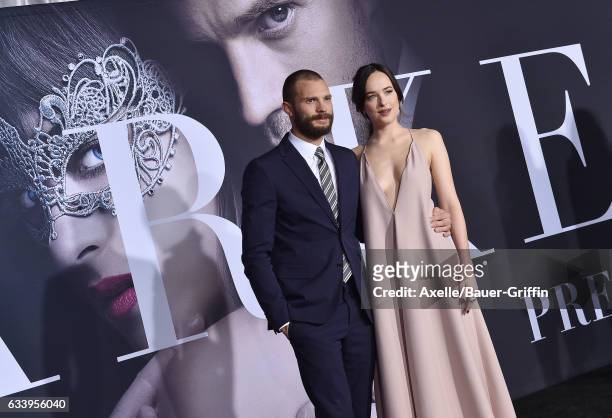 Actors Jamie Dornan and Dakota Johnson arrive at the premiere of Universal Pictures' 'Fifty Shades Darker' at The Theatre at Ace Hotel on February 2,...
