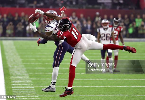Julio Jones of the Atlanta Falcons makes a catch over Eric Rowe of the New England Patriots during the fourth quarter during Super Bowl 51 at NRG...
