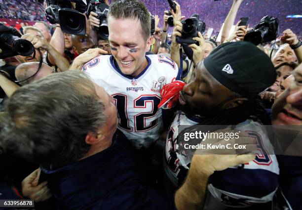 Head coach Bill Belichick, Tom Brady and LeGarrette Blount of the New England Patriots celebrate after defeating the Atlanta Falcons during Super...