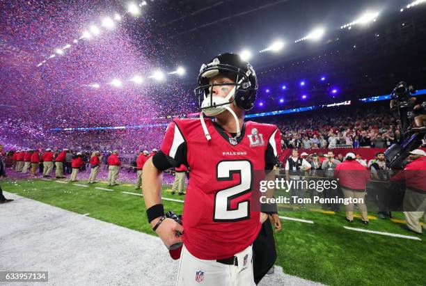Matt Ryan of the Atlanta Falcons walks off the field after losing to the New England Patriots 34-28 in overtime during Super Bowl 51 at NRG Stadium...