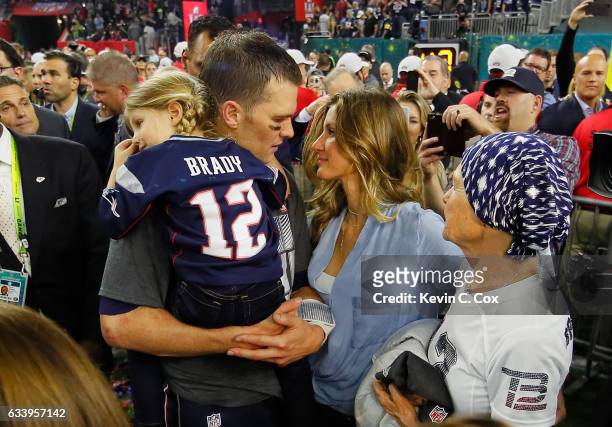 Tom Brady of the New England Patriots celebrates with wife Gisele Bundchen and daughter Vivian Brady after defeating the Atlanta Falcons during Super...