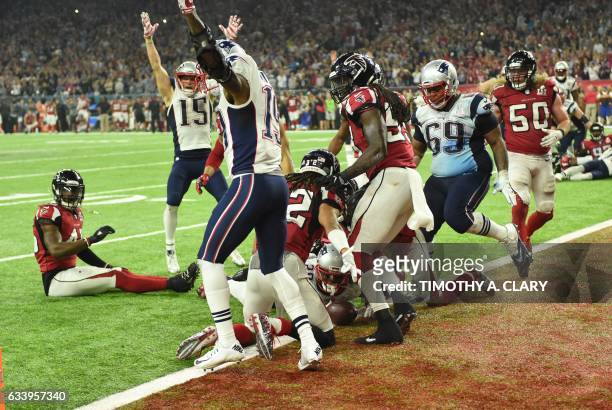 James White of the New England Patriots scores the game winning touchdown in overtime against the Atlanta Falcons during Super Bowl 51 at NRG Stadium...