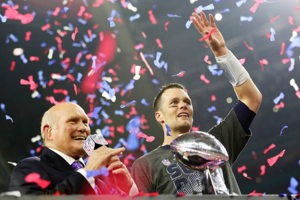 Tom Brady of the New England Patriots holds the Vince Lombardi Trophy after defeating the Atlanta Falcons 34-28 in overtime during Super Bowl 51 at...