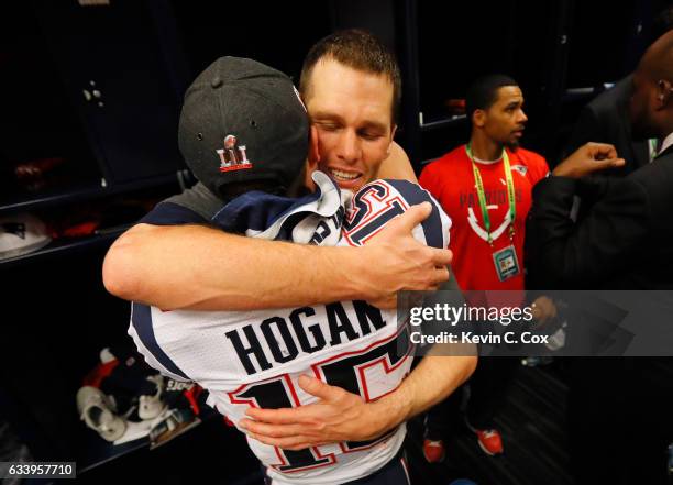 Tom Brady of the New England Patriots celebrates with Chris Hogan after the Patriots defeat the Atlanta Falcons 34-28 in Super Bowl 51 at NRG Stadium...