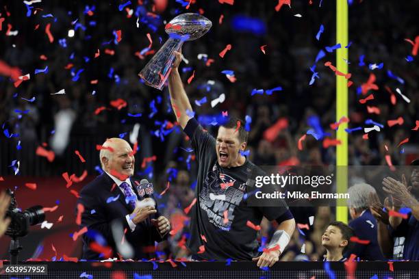 Tom Brady of the New England Patriots holds the Vince Lombardi Trophy after defeating the Atlanta Falcons 34-28 during Super Bowl 51 at NRG Stadium...