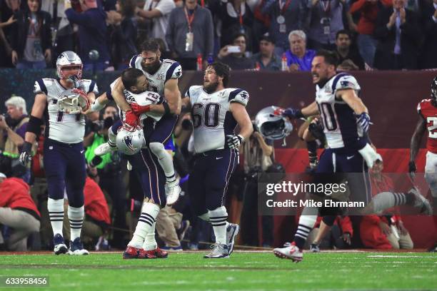 Tom Brady of the New England Patriots celebrates after defeating the Atlanta Falcons 34-28 in overtime during Super Bowl 51 at NRG Stadium on...