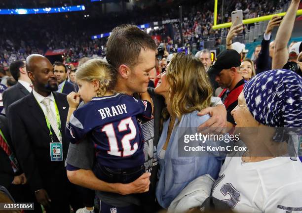 Tom Brady of the New England Patriots celebrates with wife Gisele Bundchen and daughter Vivian Brady after defeating the Atlanta Falcons during Super...