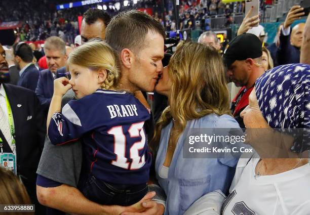 Tom Brady of the New England Patriots celebrates with wife Gisele Bundchen and daughter Vivian Brady after defeating the Atlanta Falcons during Super...