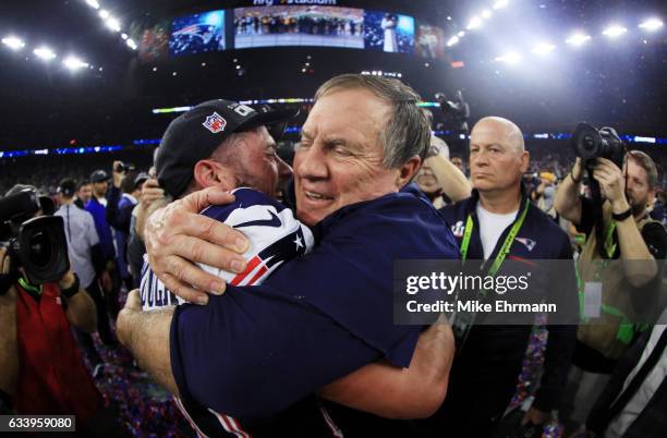 Danny Amendola and head coach Bill Belichick of the New England Patriots celebrate after defeating the Atlanta Falcons 34-28 in overtime during Super...