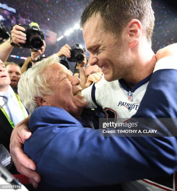 New England Patriots owner Robert Kraft and Tom Brady of the New England Patriots celebrate after defeating the Atlanta Falcons during Super Bowl 51...