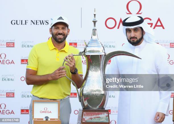 Sergio Garcia of Spain is presented with the trophy by His Highness Shaikh Ahmed Bin Mohammed Bin Rashid Al Maktoum the President of the UAE National...