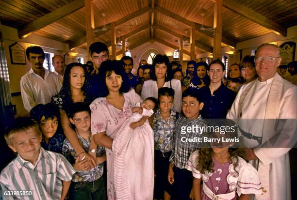 Baptism, given by Father George, taking place in the church of St Marys in Georgetown, 27th May 1997, on Ascension, a small isolated volcanic island...