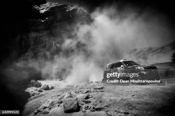 Nasser Al-Attiyah of Qatar and Matthieu Baumel of France in the MINI ALL4 RACING for AXION X-RAID TEAM compete on day 12 / stage eleven between La...