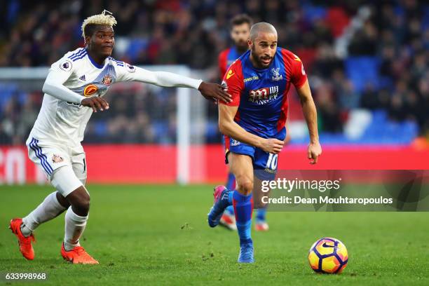 Andros Townsend of Crystal Palace goes past Didier Ndong of Sunderland during the Premier League match between Crystal Palace and Sunderland at...