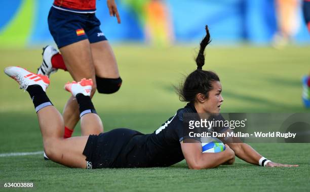 Theresa Fitzpatrick of New Zealand dives over for a try during the Women's Rugby Sevens Pool B match between New Zealand and Spain on Day 1 of the...