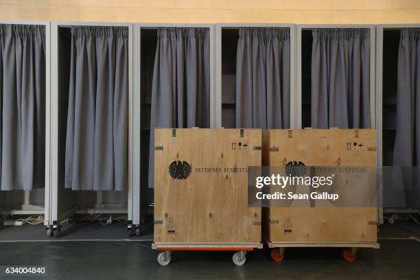 Wooden crates stand next to voting booths in the plenary hall of the Bundestag during preparations for the upcoming session of the Federal Assembly...