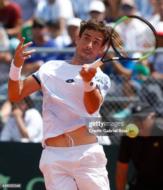 Guido Pella of Argentina takes a forehand shot during a singles match between Guido Pella and Fabio Fognini as part of day 3 of the Davis Cup 1st...