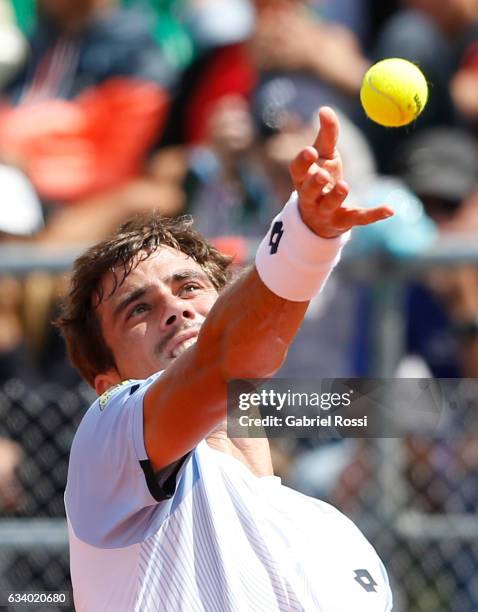 Guido Pella of Argentina serves during a singles match as part of day 3 of the Davis Cup 1st round match between Argentina and Italy at Parque...