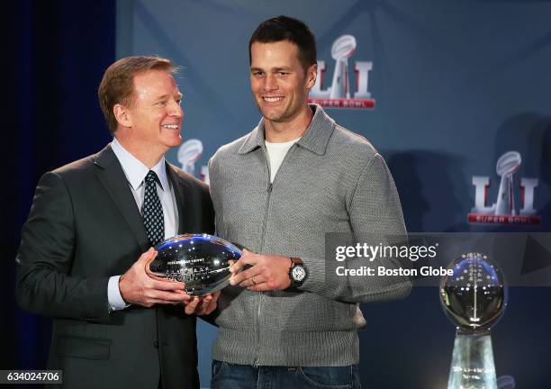 Commissioner Roger Goodell presents New England Patriots quarterback Tom Brady the Super Bowl MVP trophy in Houston on Feb. 6, 2017. The Patriots...