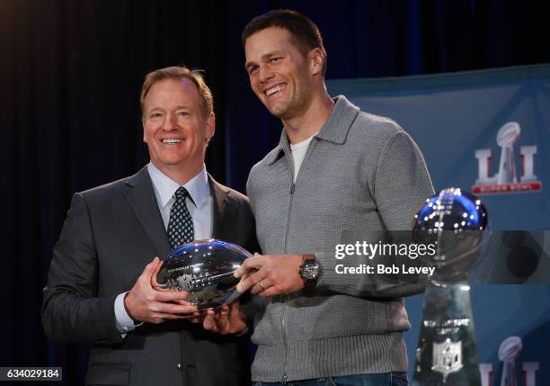 Commissioner Roger Goodell, left, and New England Patriots' Tom Brady with the Pete Rozelle MVP Trophy during the Super Bowl Winner and MVP press...