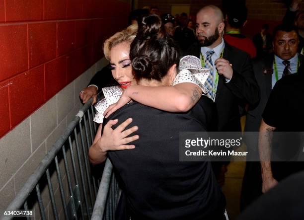 Musician Lady Gaga hugs her sister Natali Germanotta backstage after the Pepsi Zero Sugar Super Bowl LI Halftime Show at NRG Stadium on February 5,...